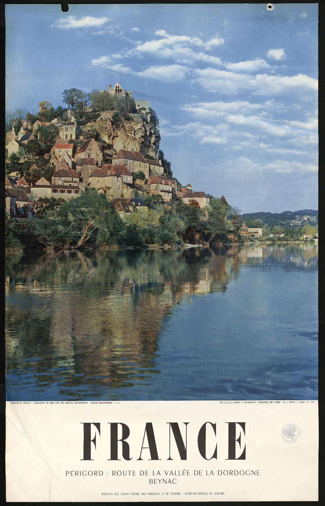 Une affiche contenant la photo d'un promontoire rocheux habité donnant sur la Dordogne occupe les deux tiers de l'affiche, le mot "France" apparaît en dessous en grandes lettres capitales puis en plus petit est inscrit "Perigord route de la vallée de la Dordogne Beynac"